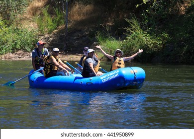 LOTUS, CALIFORNIA - JUNE 20, 2016: Group Of People In Gentle Rafting On American River On South Fork 