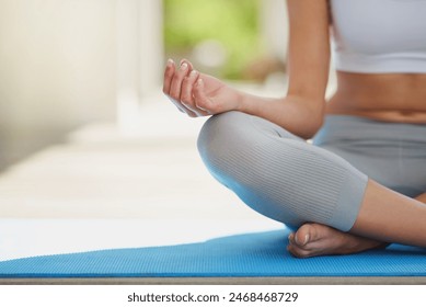 Lotus hands, meditation and woman on a patio for peace, wellness and mental health balance outdoor. Relax, zen and girl on yoga mat for mindfulness, gratitude and holistic, breathing or stress relief - Powered by Shutterstock