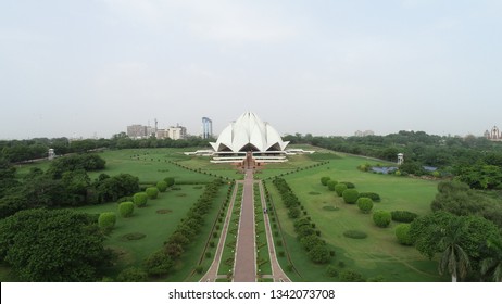 Lotus Temple, New Delhi, Delhi, India, July 29th 2018: Lotus Temple With Its Unique Architectural Design And Serene Surroundings Is A Multi Faith Bahai Temple.