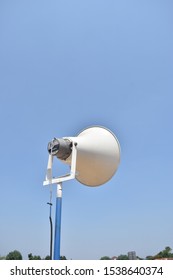 A Loud Speaker Outside Under Blue Sky