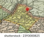 Loudon County, Virginia marked by a red tack on a colorful vintage map. The county seat is located in the town of Leesburg, VA.