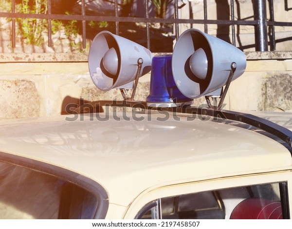 loudspeakers on the roof of the car. Signal police\
lamp. Retro style