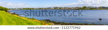 Lough Atalia bay with houses in background, Galway, Ireland