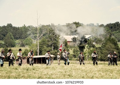 LOUISA, VA – JUNE 9, 2012: Men Re-enact The Civil War Battle Of Trevilian Station In Louisa, Virginia On The Original Site Which Took Place June 11,12, 1864 Between Union And Confederate Cavalry.