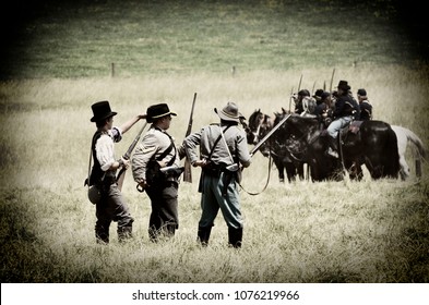 LOUISA, VA – JUNE 9, 2012: Men Re-enact The Civil War Battle Of Trevilian Station In Louisa, Virginia On The Original Site Which Took Place June 11,12, 1864 Between Union And Confederate Cavalry.