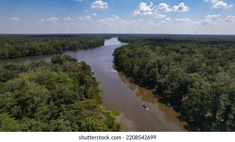 Louisiana Swamp And Cypress Tree Forest With Fishing Boat Afternoon High Angle Landscape Shot