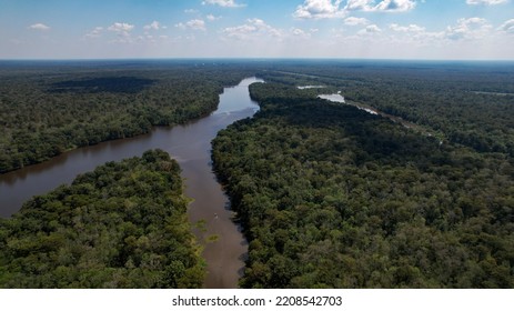 Louisiana Swamp River And Cypress Tree Forest Afternoon Fishing Boat High Angle Landscape Shot