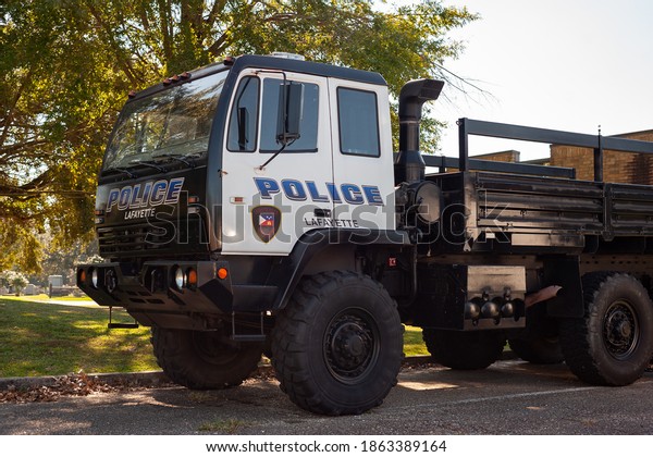 LOUISIANA, USA - OCTOBER 21, 2020: A Lafayette\
Parish cop swat car, located in Acadiana at the police officer\
department station, in South\
Louisiana.