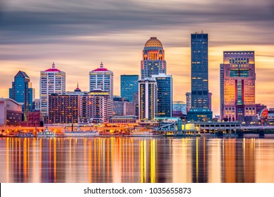 Louisville, Kentucky, USA Downtown Skyline On The Ohio River At Dusk. 