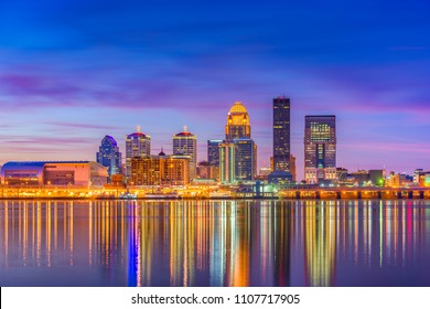 Louisville, Kentucky, USA downtown skyline at the river at dusk.