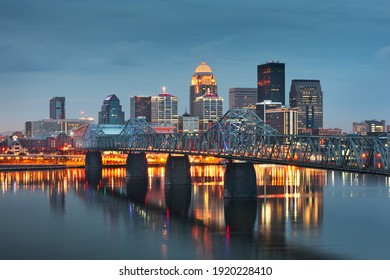 Louisville, Kentucky, USA Downtown Skyline On The Ohio River At Dusk.