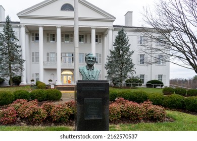 Louisville, KY, USA - December 28, 2021: Colonel Sanders statue at Yum! headquarters in Louisville, KY., USA. Colonel Sanders was an American businessman who founded the KFC restaurant chain. 