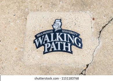 LOUISVILLE, KY, USA - JULY 22, 2018: A Walking Path Sign In The Sidewalk At Bellarmine University.