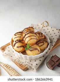 Loukoumades Or Crunchy Dough Balls With Chocolate Ganache. Popular Snack In Greece And If In Turkey It Is Called Loqma. Street Foods