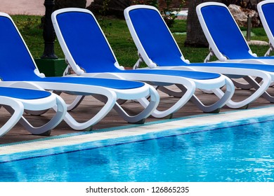 Lounge Chairs By The Pool