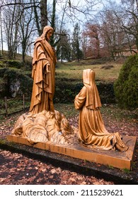 Lourdes, France - January 5, 2022: Saint Bernadette Soubirous, kneeling before Jesus and talking to him