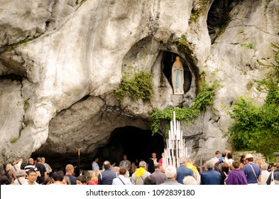 Lourdes / France - july 17 2011: Grotto in Lourdes, France, where Bernadette Soubirous saw a vision ot the Virgin Mary in a cave called Massabielle near the Gave river.