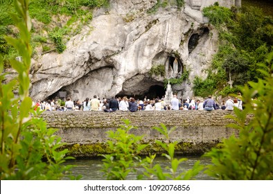Lourdes / France - july 18 2011: Grotto in Lourdes, France, where Bernadette Soubirous saw a vision ot the Virgin Mary in a cave called Massabielle near the Gave river.