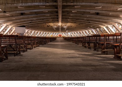LOURDES, FRANCE - JUNE 19, 2021: interior of the Saint Pius X subeterranean basilica in the sanctuary of Our Lady of Loudes in France
