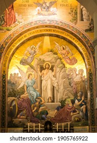 Lourdes, France, June 24 2019: Interior of the Rosary Basilica in Lourdes, France. Resurrection of the Lord Jesus, illustration of one of the mysteries of the Rosary.