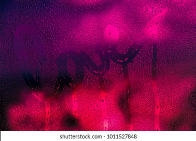 Love background, dark bright pink photo of a wet window with raindrops on it and handwriting word love, passion and desire concept, greeting card for Valentines day holiday