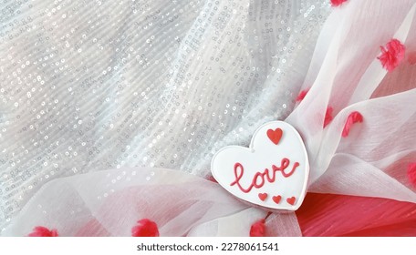 Love background for Valentine Day. Cozy design with cookie and fabric. Flat lay. Top view - Shutterstock ID 2278061541