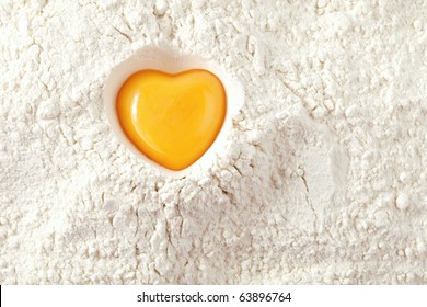 Love To Bake It!  Egg  Yolk On Flour, Full Frame