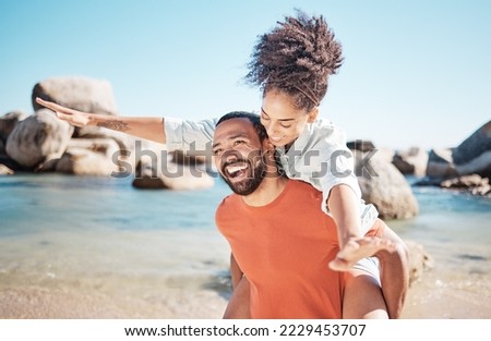 Love, beach and man piggy back woman, smile and happy together for romance, holiday and vacation outdoor. Romantic, black couple and bonding being loving, enjoy seaside getaway, laugh or happiness.