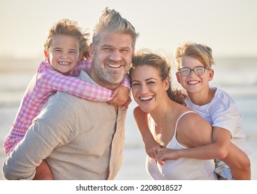 Love, Beach And Parents With Children Portrait At Sunset With Piggy Back Ride Family Fun Together. Happy, Mom And Dad Enjoy Summer Travel Vacation Bonding Time With Young Kids In The Maldives.