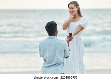 Love, Beach And A Proposal, A Couple With Engagement Ring By The Ocean. She Said Yes, Woman And Man At The Sea With Diamond Ring. Wow, Hope For Future Relationship And A Summer Marriage Announcement.