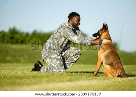 Love between soldier and trained military dog.