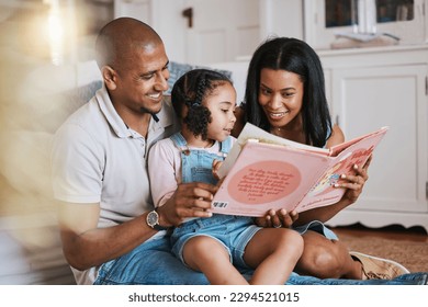 Love, bonding and family reading a book together before bed in a bedroom in the modern house. Happy, smile and girl kid enjoying a fantasy novel or story with her mother and father in their home. - Powered by Shutterstock