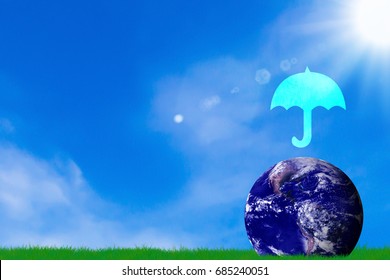Love and care the earth concept, umbrella icon and blue planet on blue sky background, Elements of this Image Furnished by NASA