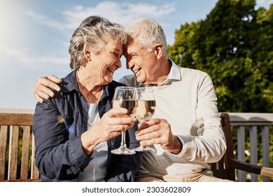 Love, cheers and happiness, old couple with wine glass to celebrate anniversary on patio of vacation home. Romance, senior man and woman in embrace with champagne toast, smile and romantic holiday. - Powered by Shutterstock