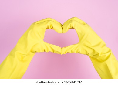 Love Cleaning Concept. Cropped Close Up Photo Of Hands Is Latex Gloves Making Showing Heart Isolated Over Pastel Background