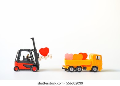Love Concept of Red Heart Sign loading / carry on Forklift Truck, Lovely Heart, A Perfect Gift or Present for Someone Special, Valentines Day background  - Powered by Shutterstock