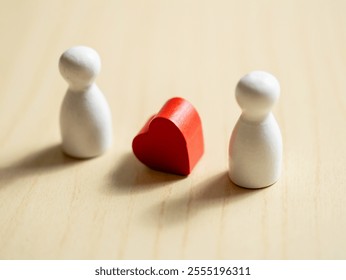 Love connection wooden figurines and heart symbol minimalist setting emotional conceptual art - Powered by Shutterstock