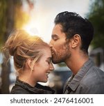Love, couple and forehead kiss in vacation, adventure and bonding together in California by flare. Happy people, boyfriend and girlfriend in relationship, dating and affection with care outdoor