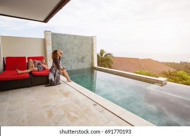 Love Couple In Luxury Villa Swimming Pool. Nice View, Hot Summer Day Outdoor 