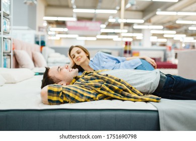 Love Couple Lying In Bed, Furniture Store Showroom