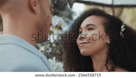 Love, dancing and couple at wedding for commitment and in celebration at a outdoor marriage ceremony or event for trust. Husband, wife and happy woman with smile and care for partner together