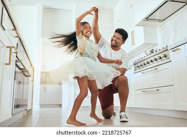 Love, dancing and father with girl in kitchen bonding, having fun and playing together. Family, affection and happiness in Indian dad with child dance, spin and relax in family home enjoying weekend - Powered by Shutterstock