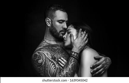 Love and desire. Latino man hugging adorable woman with love. Sensual couple in love. Erotic love of hispanic man and sexy woman.