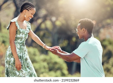 Love, Engagement And Black Man Propose To Girlfriend On Romantic Date Outdoors, Happy And Excited. African Woman Surprise Sweet Gesture, Enjoying Special Relationship Moment On Outdoor Date Together