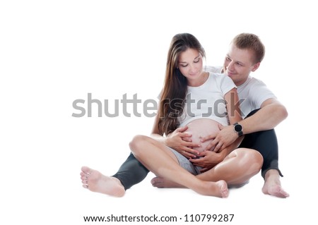 Similar – Pregnant woman embraced by her husband