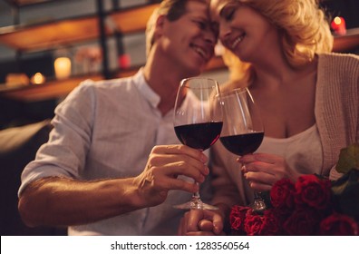 Love has no age! Romantic senior couple celebrating Saint Valentine's Day at home. Beautiful woman and handsome man enjoying spending time together. Happy Saint Valentine's Day! - Powered by Shutterstock