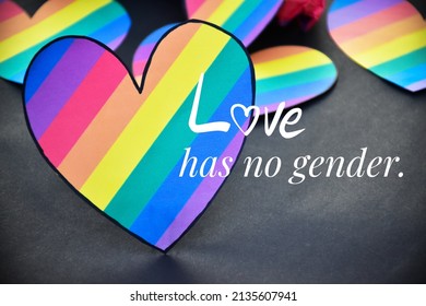 'love has no gender', on heart and black background.