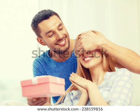 Similar – Image, Stock Photo Hand with a gift on pink background with copy space