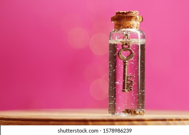 Love Key Inside Miniature Glass Bottle. Love Potion With Key.