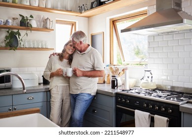 Love, kitchen and senior couple relax with cup of coffee, tea or hot drink while bonding and connect at home. Family, peace and elderly man and woman enjoy quality time, retirement and life together - Powered by Shutterstock